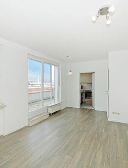 Lichtdurchflutete Maisonette mit sonniger Dachterrasse - München
