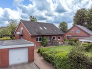 Ruhig gelegenes Zweifamilienhaus mit schön eingewachsenem Grundstück in Fockbek - voll vermietet - Fockbek