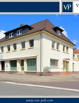 Wohn- und Geschäftshaus mit 2 Wohneinheiten, 2 Gewerbeeinheiten und 6 Garagen - Genthin