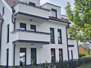 Moderne 2-Zi-Neubau-Terrassenwohnung mit gehobener Innenausstattung, EBK & Stellplatz - Lemförde