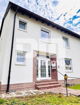 Umfangreich saniertes Einfamilienhaus mit Garage + PV Anlage auf großem Grundstück - Niestetal