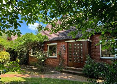 EINFAMILIENHAUS MIT BAUGRUNDSTÜCK, KAMIN UND GARAGE IN AURICH RAHE