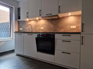 Charmante Erdgeschosswohnung mit Einbauküche. - Bunde