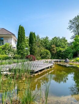 Klassische Ästhetik: Stilvolles Einfamilienhaus mit naturnah gestaltetem Traumgarten - Grünwald