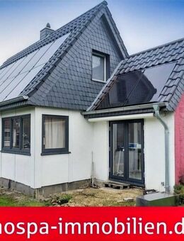 Kleines Einfamilienhaus mit modernisierten Elementen und Renovierungsbedarf im Innenbereich - Schleswig