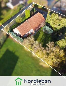 Vielseitiges Wohn- und Geschäftshaus mit Potenzial - großzügiges Grundstück und zentrale Lage - Ostrhauderfehn