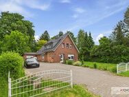Direkt am Deich im Seemannsort Barßel. Vermietetes Wohnhaus mit Garage auf wunderschönem Grundstück - Barßel