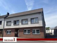 Attraktives Mehrfamilienhaus - Kapitalanlage mit drei Wohneinheiten und neun Garagen - Übach-Palenberg