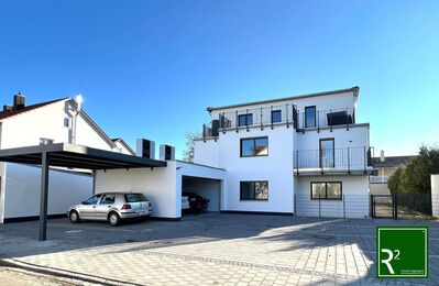 Neubau 4-Zimmer Wohnung im Erdgeschoss mit sonnigem Gartenanteil in energieeffizientem 5 Familienhaus