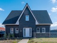 Neuwertiges Dreigiebelhaus in schöner Siedlungslage von Moormerland - Moormerland