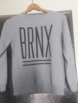 Grauer Pulli mit Aufdruck - Gr. 152 - Primark - Pirmasens
