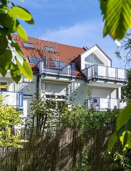 AIGNER - Lichterfülltes Dachgeschoss: Wohnen auf zwei Etagen mit Südterrasse - am Agricola-Park - München