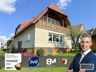 Einfamilienhaus mit Garage und großem Grundstück - Calden