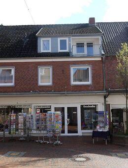 Dachgeschosswohnung mit EBK, kl. Balkon und Garage in Wittmund (Fußgängerzone) - Wittmund