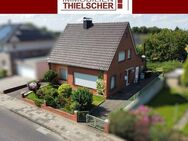 Freistehendes Einfamilienhaus mit Garage und Garten in Boscheln - Übach-Palenberg