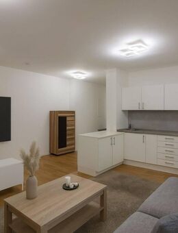 KENSINGTON - Exklusiv - Traumhafte 2-Zimmer-Gartenwohnung in ruhiger Wohnanlage - München