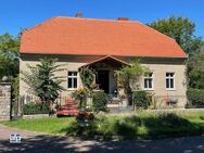 Ufergrundstück - bebaut mit einem 2-geschossigen Landhaus mit Remisen, einem Gartenwohnhaus etc. - Bestensee