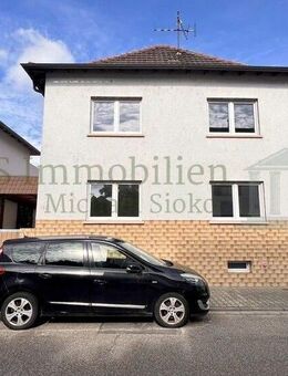 ** Charmantes Einfamilienhaus in zentraler Lage in Lampertheim - viel Platz für die ganze Familie ** - Lampertheim