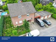 Attraktives Einfamilienhaus mit Potenzial zum Zweifamilienhaus, schönem Garten und Garage! - Rheda-Wiedenbrück