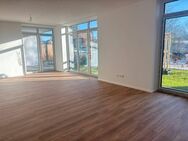 Wohnen am Norder Tief: Ferien- oder Eigentumswohnung mit Blick auf die Mühle und kleinem Garten! - Norden