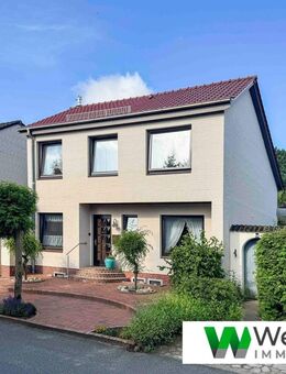 Charmantes Einfamilienhaus mit 5 Zimmern, 235 m² Wohn- und Nutzfläche, Garage & 2 Balkonen in Oelixdorf - Oelixdorf