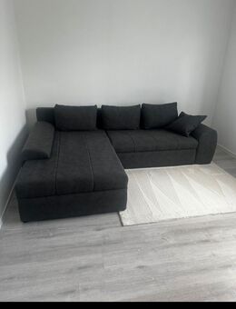 Graues Sofa - Plettenberg Zentrum