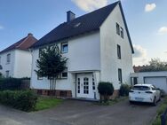 Zweifamilienhaus mit ausgebautem Dachgeschoss in familienfreundlicher Wohnlage Wiedenbrück - Rheda-Wiedenbrück