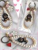 Verkaufende Schlüsselanhänger in 34497