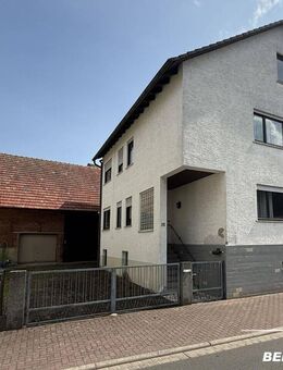 BERK Immobilien - Charmantes Einfamilienhaus mit zwei Wohneinheiten und großzügiger Scheune + Garage - Alzenau
