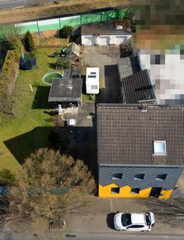 Langenfeld-Richrath: Gemütliches Ein- bis Zweifamilienhaus mit angrenzendem Baugrundstück - Langenfeld (Rheinland)