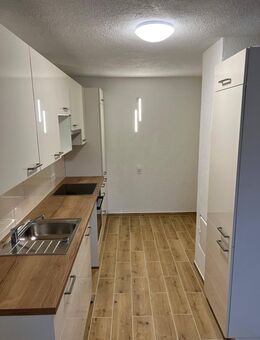 2,5 Zimmer Wohnung mit Freisitz, Garten und Stellplatz - Murg