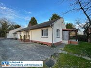 Zweifamilienhaus mit Nebengebäuden auf herrlichem Grundstück - Estorf (Landkreis Nienburg (Weser))
