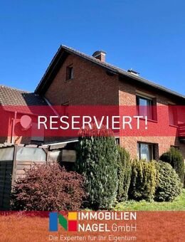 Solides Zweifamilienhaus mit Gartenidylle in Löhne-Mennighüffen! - Löhne