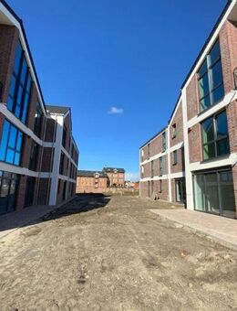 Schöne Erdgeschosswohnung mit knapp 85 m² Wohnfläche mit Blick auf das Norder Tief - Norden