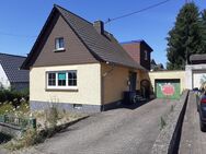 Freistehendes Einfamilienhaus mit Wintergarten, Garage und großem Garten, in ruhiger Wohnlage von Völklingen-Röchling Höhe - Völklingen