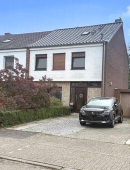 Ein Zuhause zum Ankommen-Familienfreundliches Reihenmittelhaus mit Gartenidylle und solider Modernisierung in Weeze - Weeze