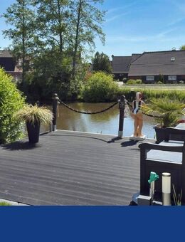Direkt am Wasser! Stilvolle Wohnung mit hochwertigem Keller - Dornum
