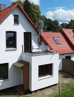 Eine Familie unter zwei Dächern - Grönwohld