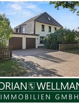 Oyten - Bassen | Gepflegtes Einfamilienhaus mit viel Platz, zwei Terrassen, großem Garten und Doppelgarage in idyllischer Ortsrandlage - Oyten