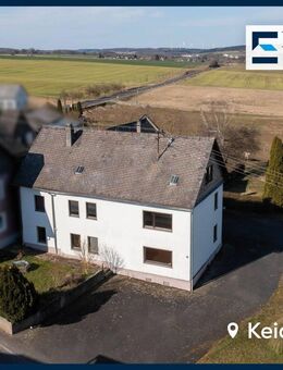 Geräumiges Ein- bis Zweifamilienhaus mit drei Garagen auf großem Grundstück nahe Simmern - Keidelheim