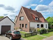 Charmantes Einfamilienhaus mit Einliegerwohnung und Nebengebäude - Scheeßel