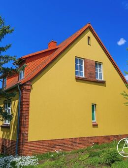 zum Teil vermietetes Zweifamilienhaus mit Carport und Nebengebäuden - Neuruppin