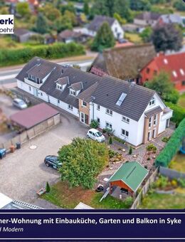 Moderne 3-Zimmer-Wohnung mit Einbauküche, Garten und Balkon in Syke - Syke