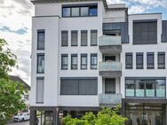 3-Zimmer-Eigentumswohnung mit Balkon & Tiefgaragenstellplatz in top gepflegtem Wohn- & Geschäftshaus - Siegburg
