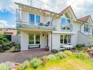 Charmante Eigentumswohnung mit Terrasse und eigenem Garten - Weiskirchen