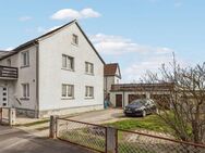 Einfamilienhaus mit Einliegerwohnung und großem Potenzial in Langenfeld. - Langenfeld (Bayern)