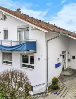 Attraktives Investment: Haus mit zwei Wohneinheiten, Gewerbefläche und vielen Stellplätzen in Wehrheim - Wehrheim