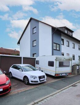 Attraktives Mehrfamilienhaus mit drei Wohneinheiten in Lonnerstadt - Lonnerstadt