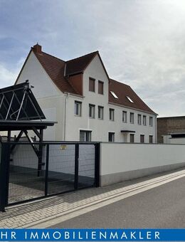 Vielseitig nutzbares Mehrfamilienhaus mit Garagen, Solaranlage und großem Grundstück mit weiterer Bauoption - Magdeburg
