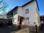 Angebot für Handwerker mit Potential - massiv gebautes Einfamilienhaus mit Werkstatt und Garage - Rheinau